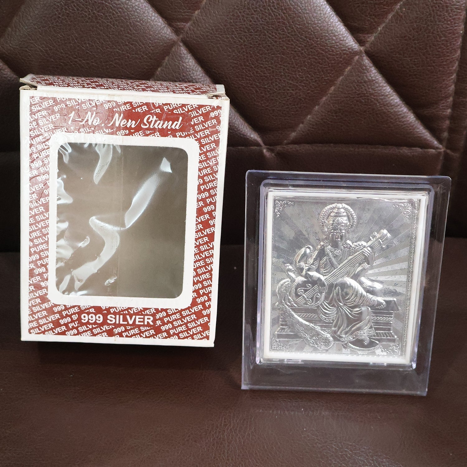 Elegant Silver Saraswati Maa Photo Frame with Stand (1 Pc) Elegant Silver Saraswati Maa Photo Frame with Stand (1 Pc)